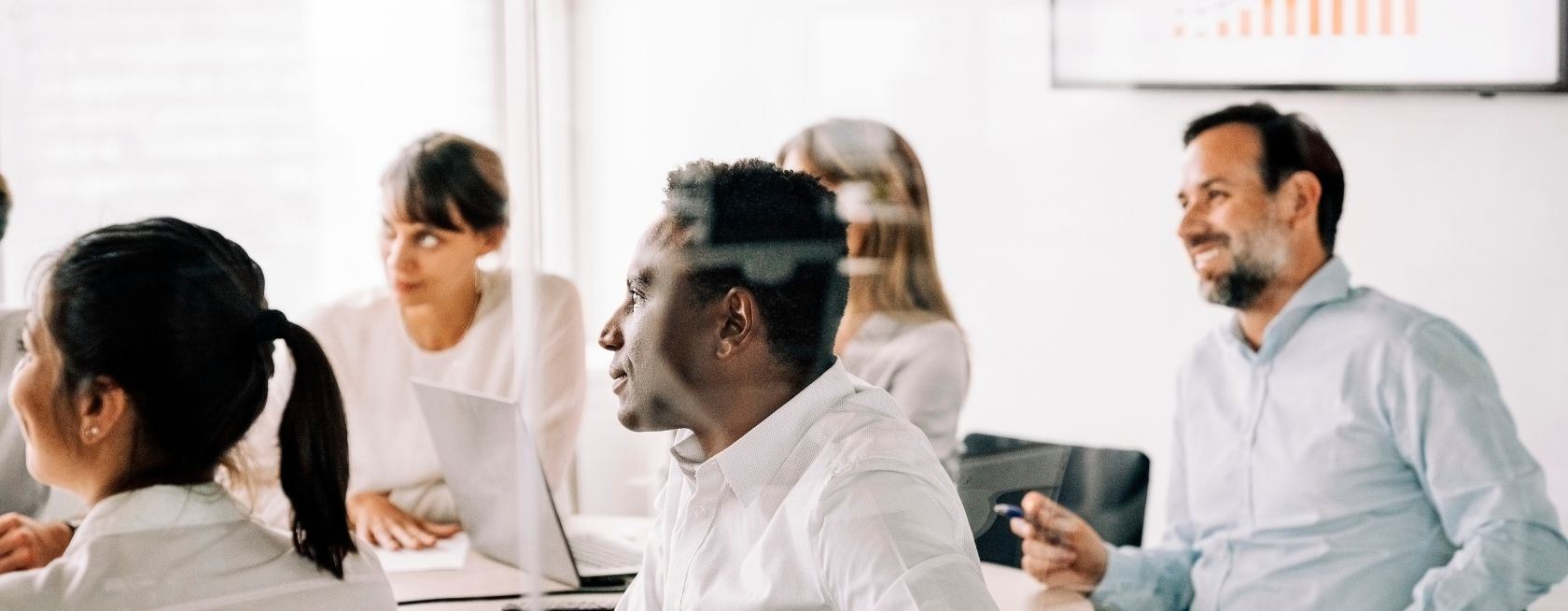 Business people attending a meeting